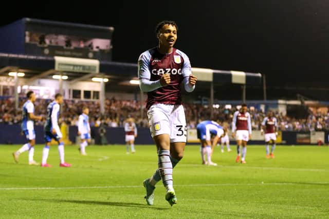 Cameron Archer celebrates scoring for Villa at Barrow.