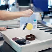 Many UK airports have scrapped the 100ml liquid limit - but has it been dropped at Birmingham and East Midlands Airport? (Photo: Chalabala - stock.adobe.com)