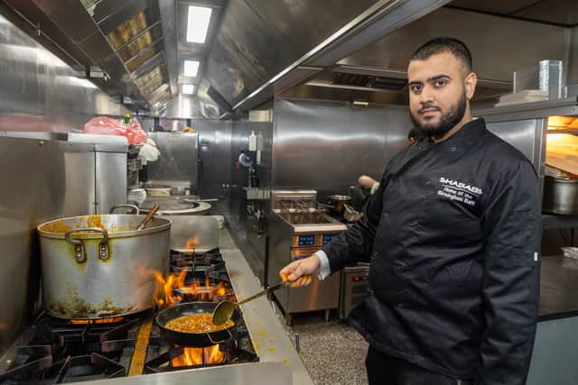 Hamza Hussain cooking Chicken Balti at Shababs Balti Restaurant Birmingham, Balti Triangle