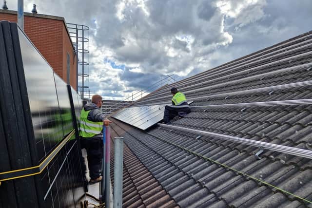 Rooftop solar panels being installed at Guru Nanak Gurdwara Smethwick