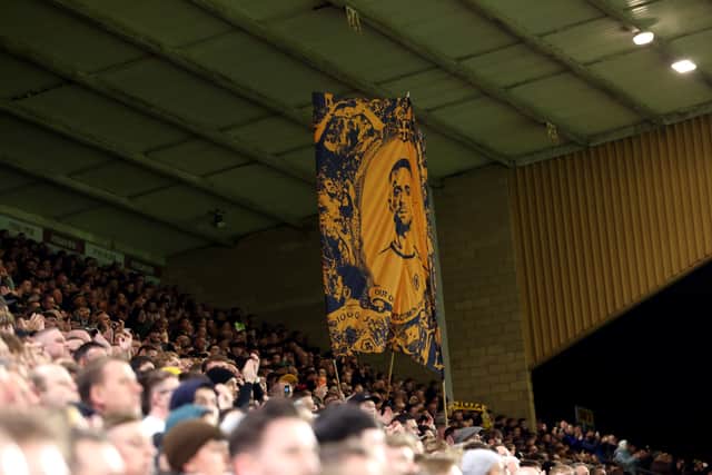 WOLVERHAMPTON, ENGLAND - MARCH 03: Fans display a flag in memory of former Liverpool and Wolverhampton Wanderers player Diego Jota during the Premier League match between Wolverhampton Wanderers and Liverpool at Molineux on March 03, 2026 in Wolverhampton, England. (Photo by David Rogers/Getty Images)