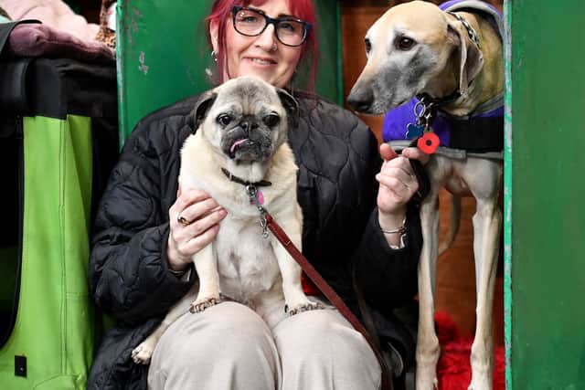 Heidi Woodgate with her dogs Jeffrey and Yoski at Crufts 2025