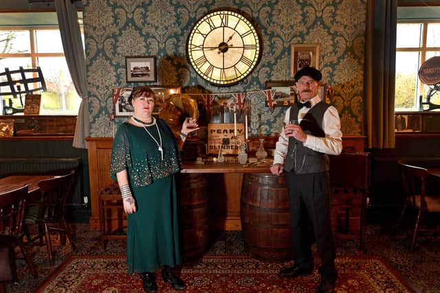 The couple have decorated the pub with lots of antiques