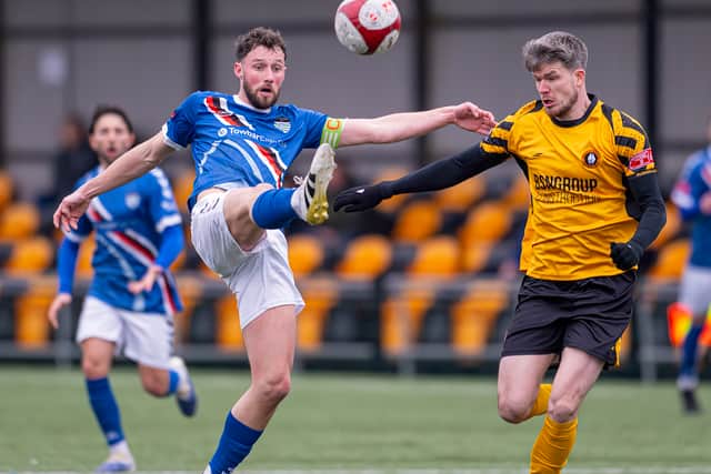 Rushall Olympic vs Whitby Town March 7th 2026. Liam McAlinden loses out. (Picture: Jim Wall)
