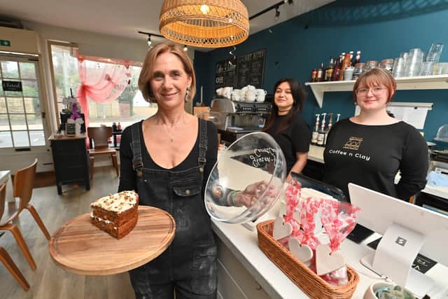 Ruth with members of the Coffee n Clay team Tash Guese-Stothard and Kat Pickford. Photo: Steve Leath