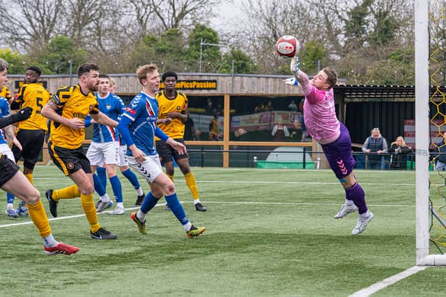 Rushall Olympic vs Whitby Town March 7th 2026. Whitby keeper Shane Bland makes a fingertip save to keep the ball out. (Picture: Jim Wall)