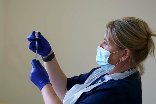 File photo dated 23/10/2021 of a nurse preparing a vaccine. None of the main childhood vaccines in England reached the 95% uptake target in 2024/25, new figures show. Some 91.9% of five-year-olds had received one dose of the MMR (measles, mumps & rub