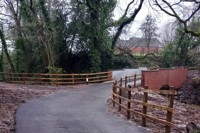 Work included adding a new concrete saddle and parapets and added protections to foundations