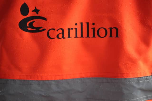 A worker wearing a hi-vis jacket at a Carillion construction site in London. Photo: Yui Mok/PA Wire 