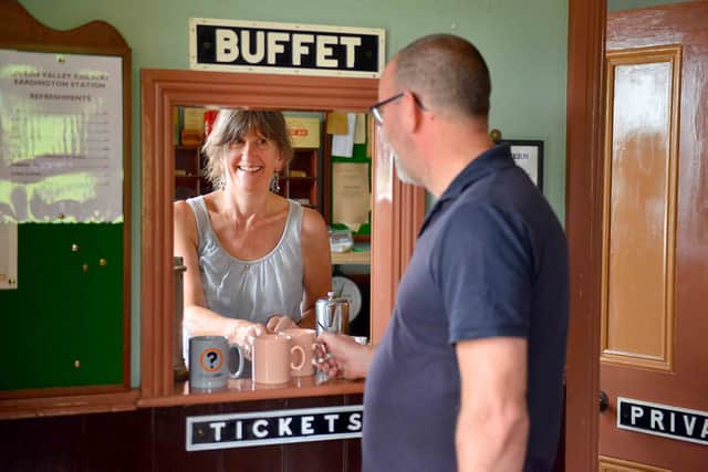 Anne Downs working in the ticket office