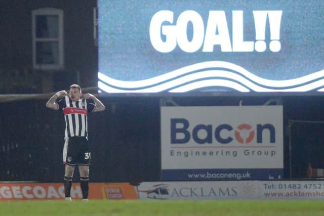 Andy Cook scored twice against his former club in the second half.