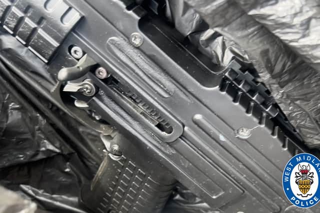 A photo of a firearm believed to be advertised for sale was found in Woodcock's phone.