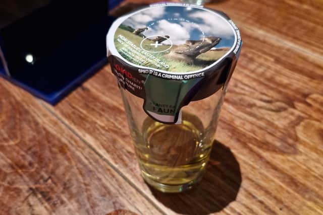 The drink caps can be stuck onto a glass or a bottle