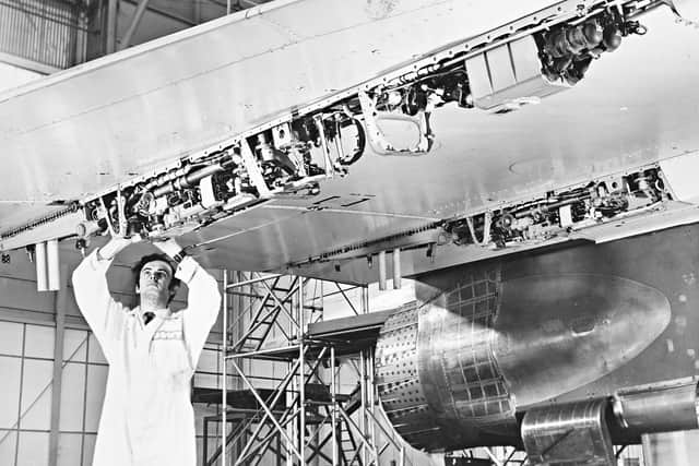 'A complicated package from one of Wolverhampton's industries. A Dowty Boulton Paul service engineer checks a flying control unit made by his firm and installed in a Concorde wing. The company has just announced a £1m. order for flying controls for the first six production Concordes.' - July 1970.