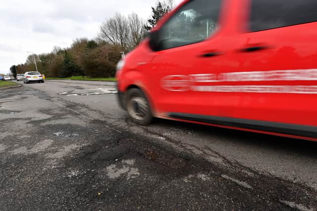 Residents are complaining about the potholes in Stowheath Lane.