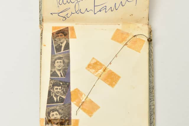 John Lennon, Paul McCartney, George Harrison and Ringo Starr signed after a gig in 1963. Affixed next to the autographs is George’s guitar string snapped that same night