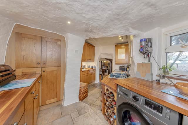 A stunning 16th-century West Midlands cottage built into a carved-out cave has gone on sale