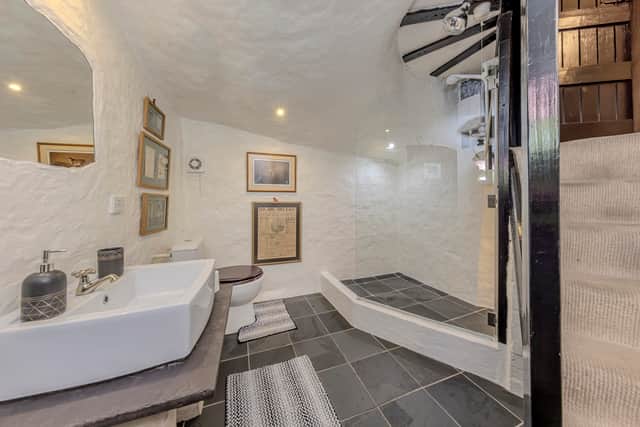 A stunning 16th-century West Midlands cottage built into a carved-out cave has gone on sale
