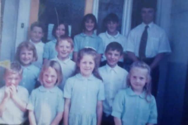 Emmanuel School's original pupils in 1996 with Head Teacher Jonathan Swain