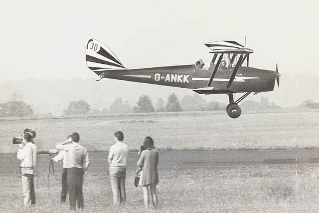 August 25, 1970: 'A television crew films a Tiger Moth landing at Halfpenny Green in preparation for Monday's air race.' 