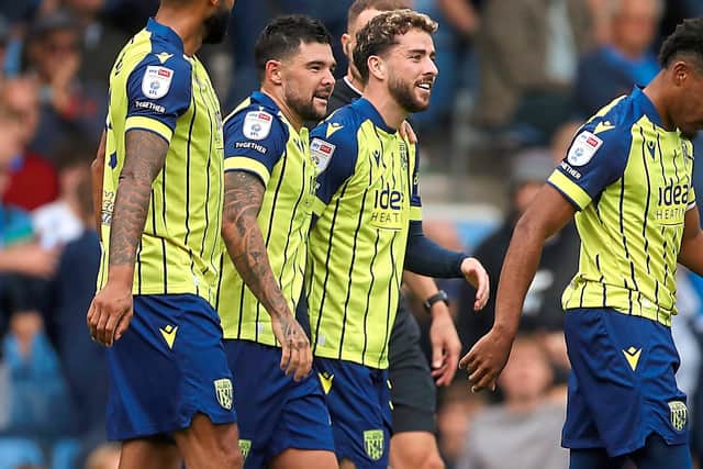 Alex Mowatt, second left, netted twice in the 3-0 win at Portsmouth early last season. Albion will hope to have Mowatt available to start on Saturday. (Adam Fradgley/Getty)