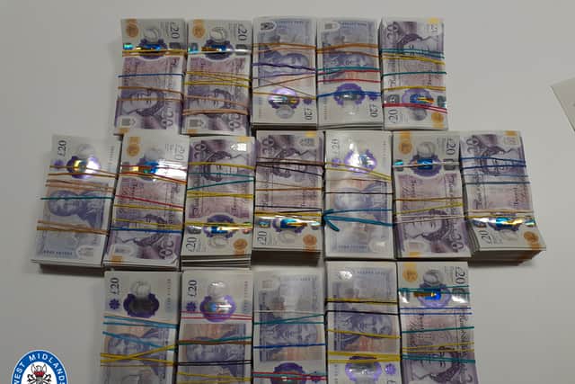 The £85,000 recovered from a vehicle
