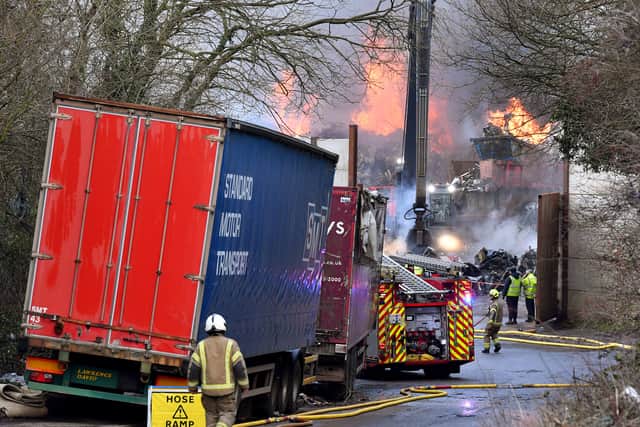 The scene in Oak Lane, Kingswinford as firefighters tackle a scrapyard fire.