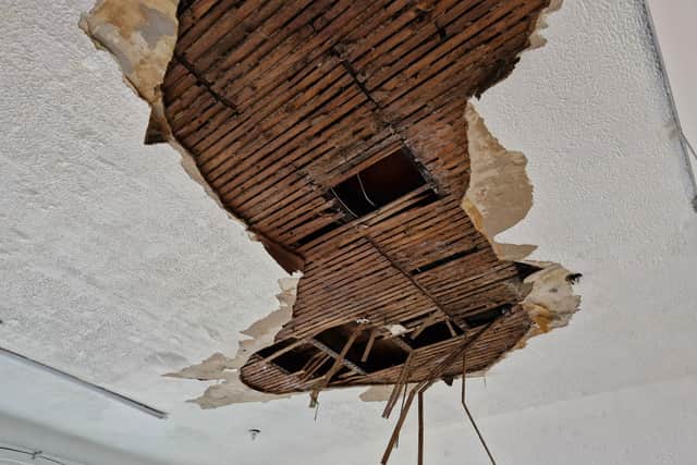 The ceiling is covered in large holes