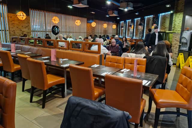 The restaurant area is well-lit and spacious