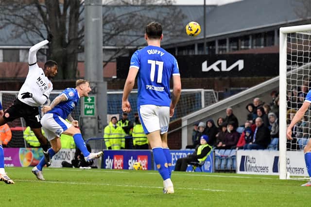 Daniel Kanu halves the deficit with his 15th goal of the season in all competitions.