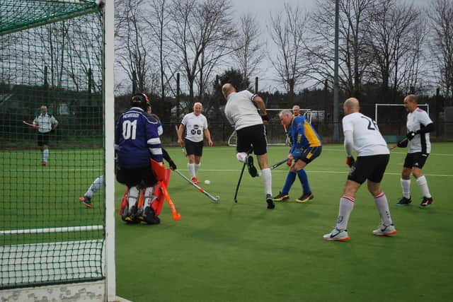Stourport shoots towards the goal.