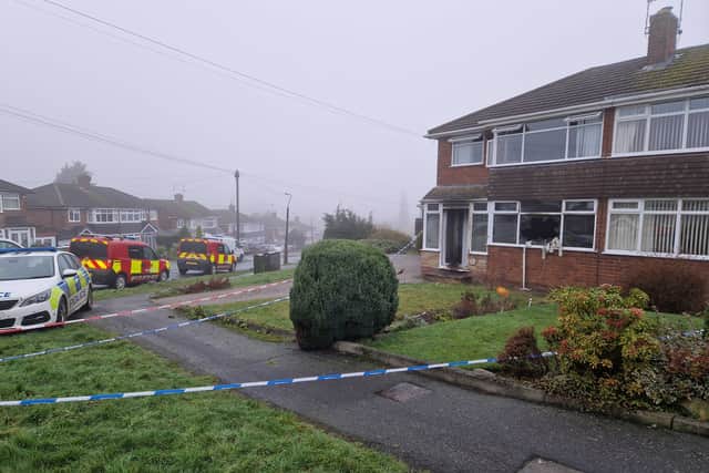 Police cordon around a house following a fire on Wendover Road in Wolverhampton