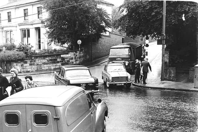 August 26, 196, the caption reads: 'The worst road junction in Wolverhampton, the Bath-Road - Wadham's-hill crossing. Vehicles descend the hill at speed; ascending traffic stalls on the steep approach both lines of traffic cross each other. "A shocking junction," says Wolverhampton stipendiary magistrate.' 