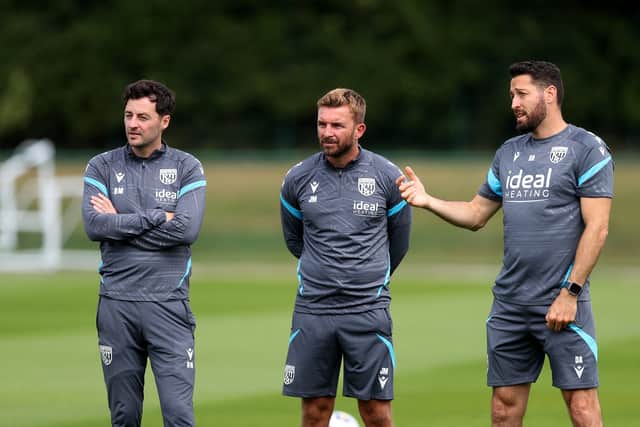 James Morrison, centre, with former boss Ryan Mason, left, and fellow coach Damia Abella in the summer. Morrison and Abella are now in interim charge. (Photo by Adam Fradgley/West Bromwich Albion FC via Getty Images)