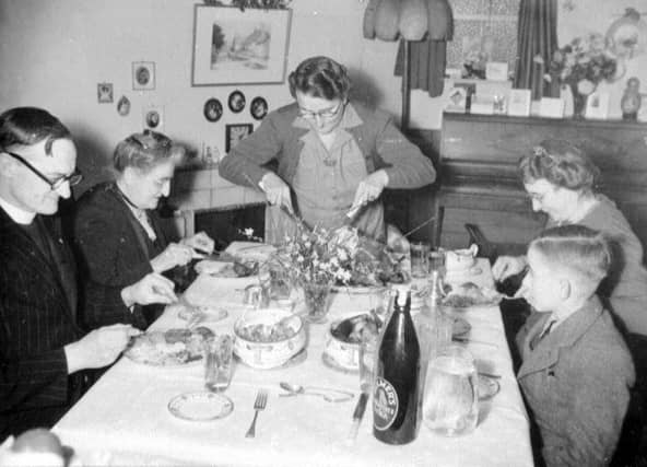 Wartime feast – This was a Christmas dinner for the Roden family of High Street, Bridgnorth, on Christmas Day, 1944. The man on the left is wearing a dog collar and it is believed he is Ernest Albert Toulous, vicar of St Leonard’s Church, Bridgnorth, from 1938 to 1948. The image is courtesy of Jonathan Stubbs.