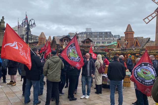 Members of Unite the union gather outside Birmingham Council House on Tuesday, November 4. Credit: Alexander Brock.
