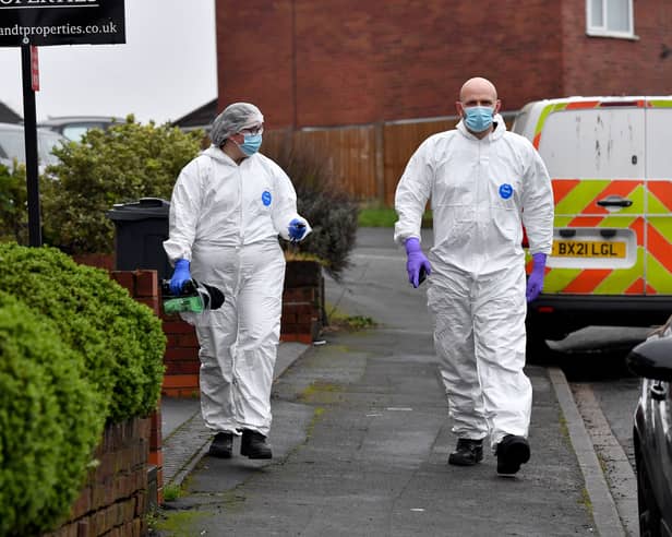 Police at the scene of a murder in Barncroft Road, Oldbury, on Sunday