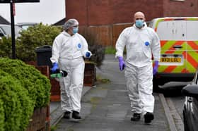 Police at the scene of a murder in Barncroft Road, Oldbury, on Sunday