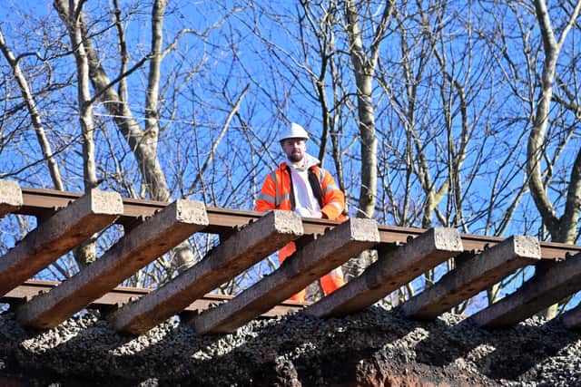 The earth beneath the track fell away.