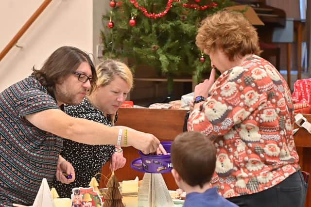 Volunteers gave out sweets to the young and not so young. Photo: Steve Leath