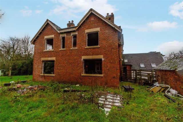 The part-built extension at the property which agents say can be used as a kitchen or living accommodation
