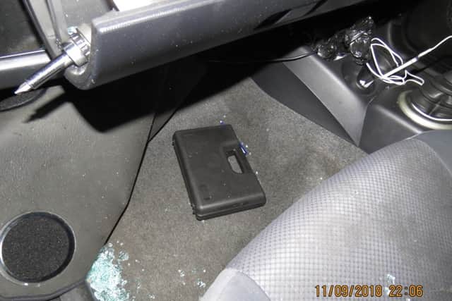 One of the firearms was found in a box in a car