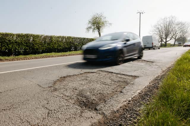 'Sort out our potted roads!' - a week-long series looking at the the appalling state of our roads was launched. Pictured is a 'pothole nightmare' on the A442 from Telford to Bridgnorth.