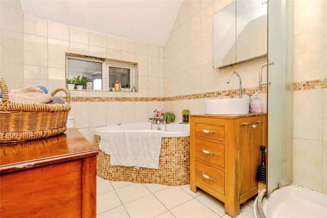 Another view of the bathroom with walk-in shower