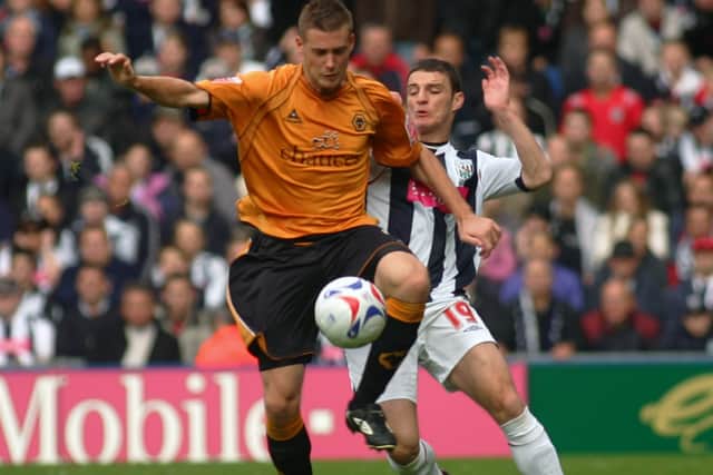 Rob Edwards in playing action for Wolves