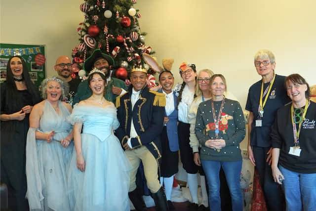 Cinderella cast with staff at Ronald McDonald House Birmingham