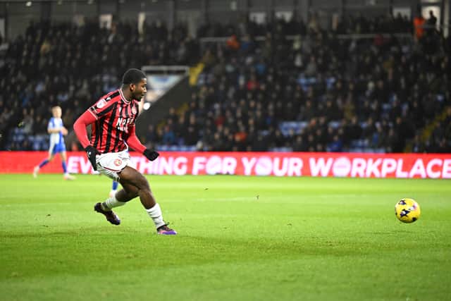 Daniel Kanu rolled in his 10th goal of the season for Walsall in the win over Oldham on Wednesday.