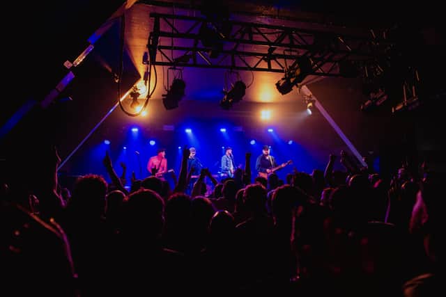 The Assist live on stage