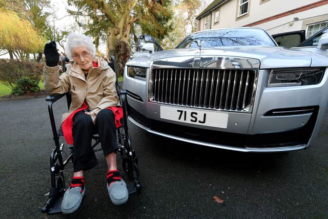 Dorcas Dearne, aged 101 from The Cedars Nursing Home, Albrighton got a surprise after staff arranged a ride in a Rolls Royce. Photo: Tim Thursfield