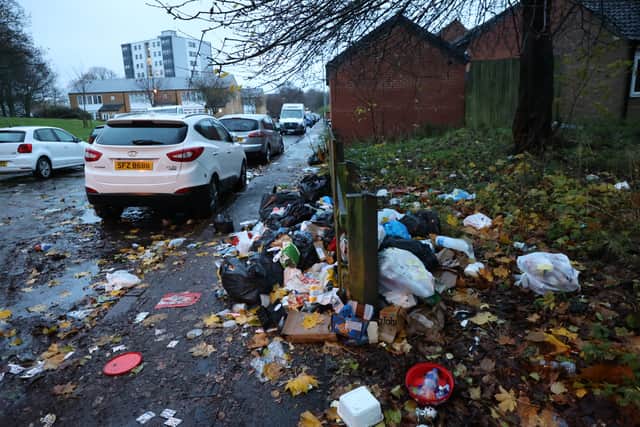 Rubbish piled up on Vaughton Street in Birmingham. Birmingham agency bin workers attend rally on Smithfield depot in Birmingham on first day they join the strike with Birmingham City Council directly employed bin workers.